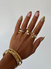 CLOVER CHARM WHITE BANGLE best gold plated tarnish and water resistant piece by Irish Jewellery brand - Lynott Jewellery